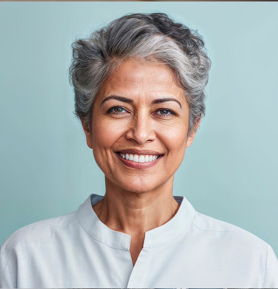 headshot of mature person smiling brightly for their photoshoot