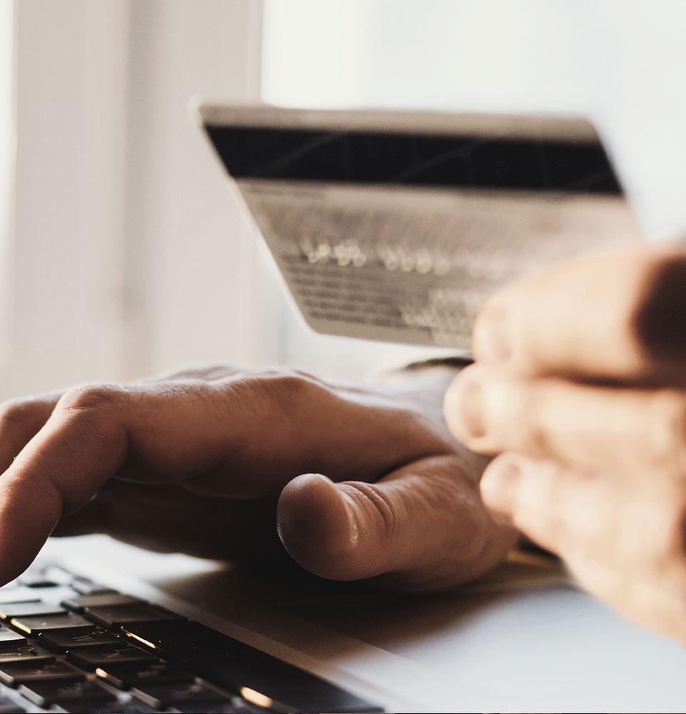 close up view of a person putting in their credit card info