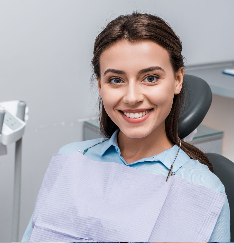 patient smiling brightly and prep and ready for their dental treatment
