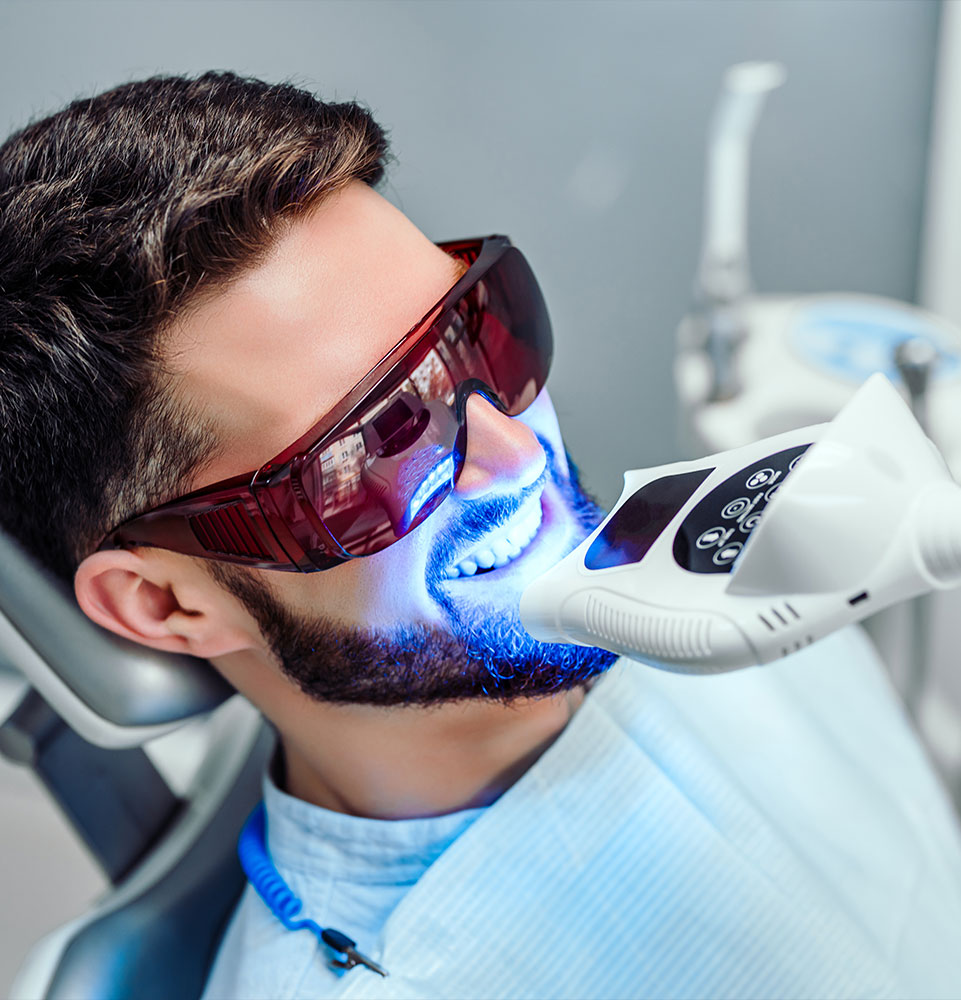 person undergoing teeth whitening process