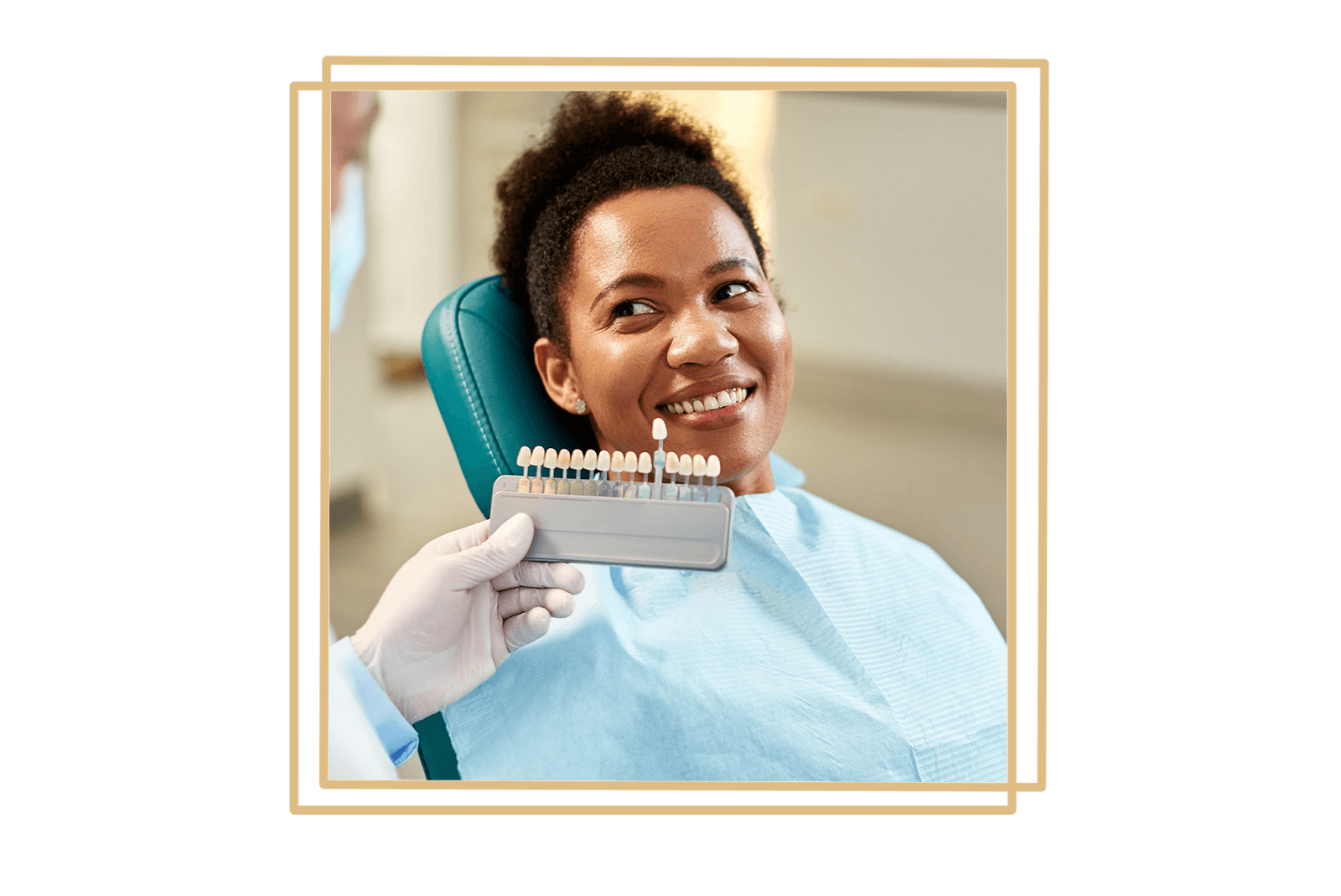 patient being shown a teeth whitening scale for their dental treatment