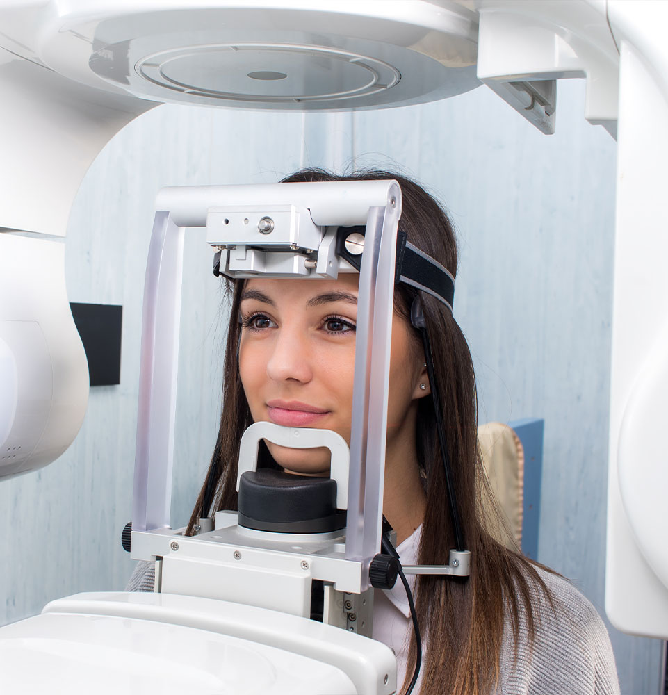 Girl taking digital 3D panoramic dental x-ray