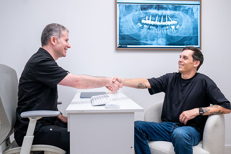 doctor shaking Patients hand