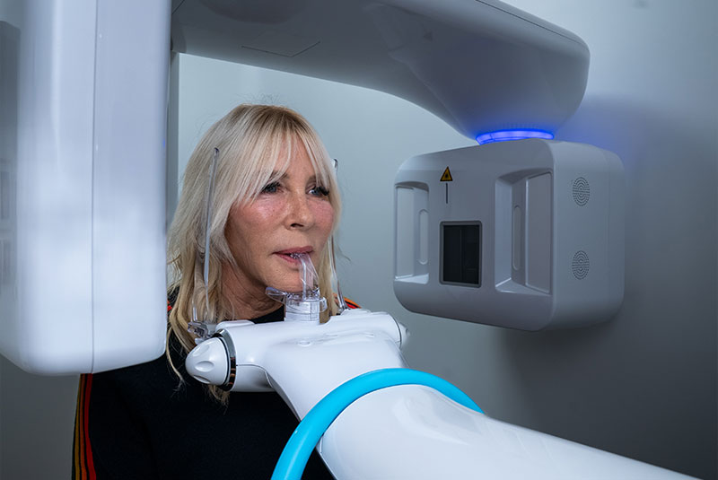 Patient taking a dental x-ray