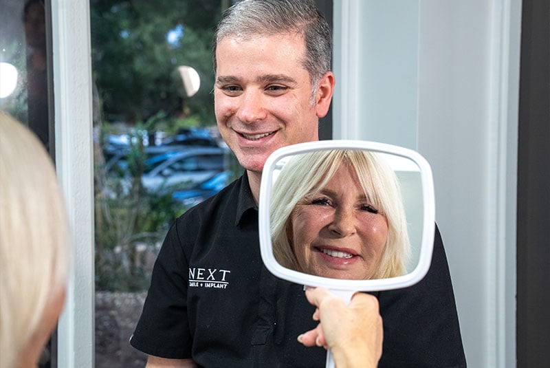 Patient looking into mirror