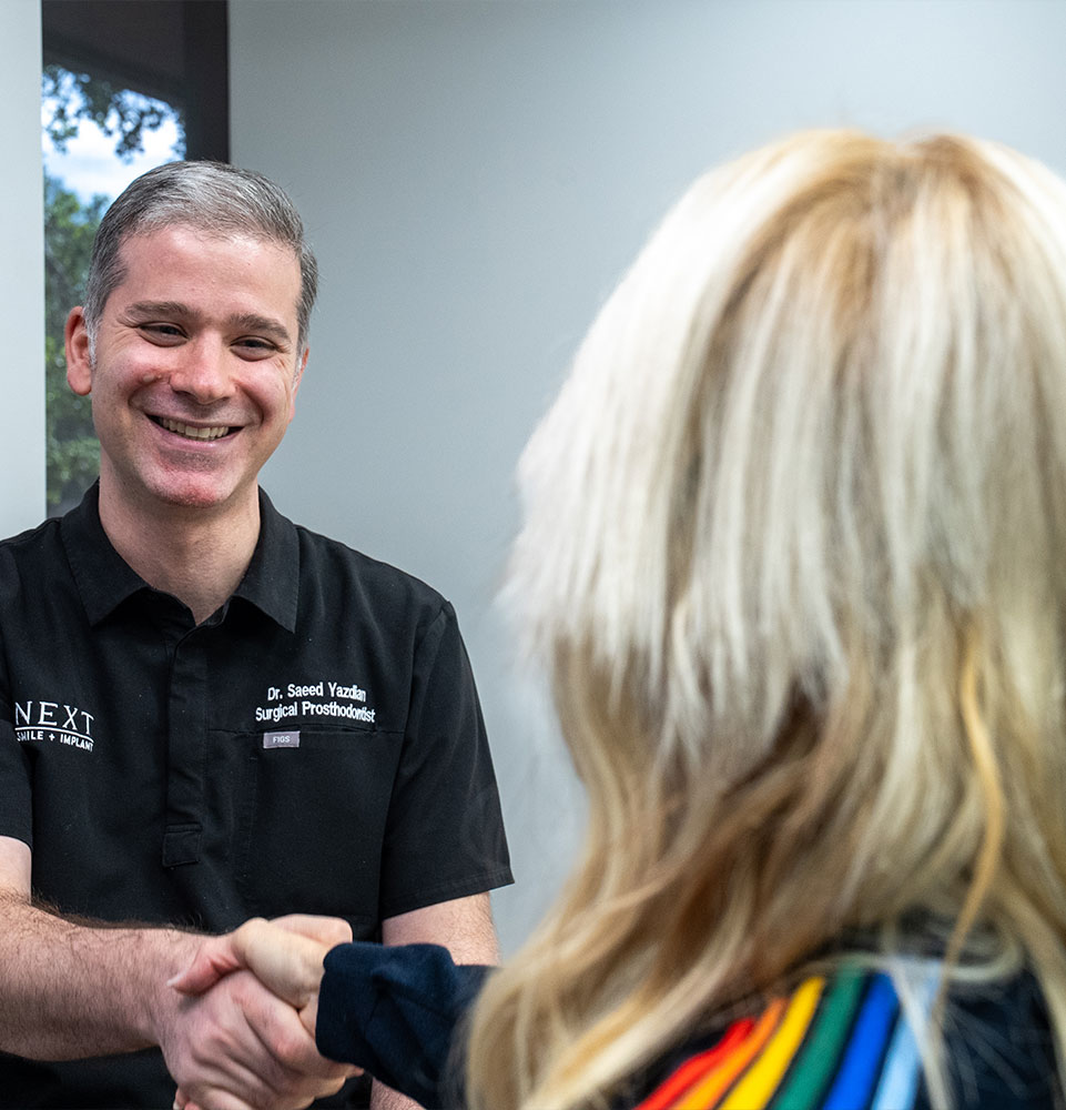 Doctor shaking a patient hand