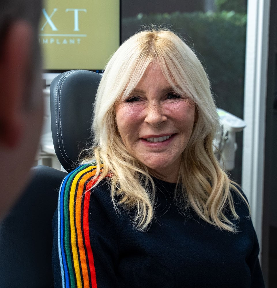 Patient smiling at doctor