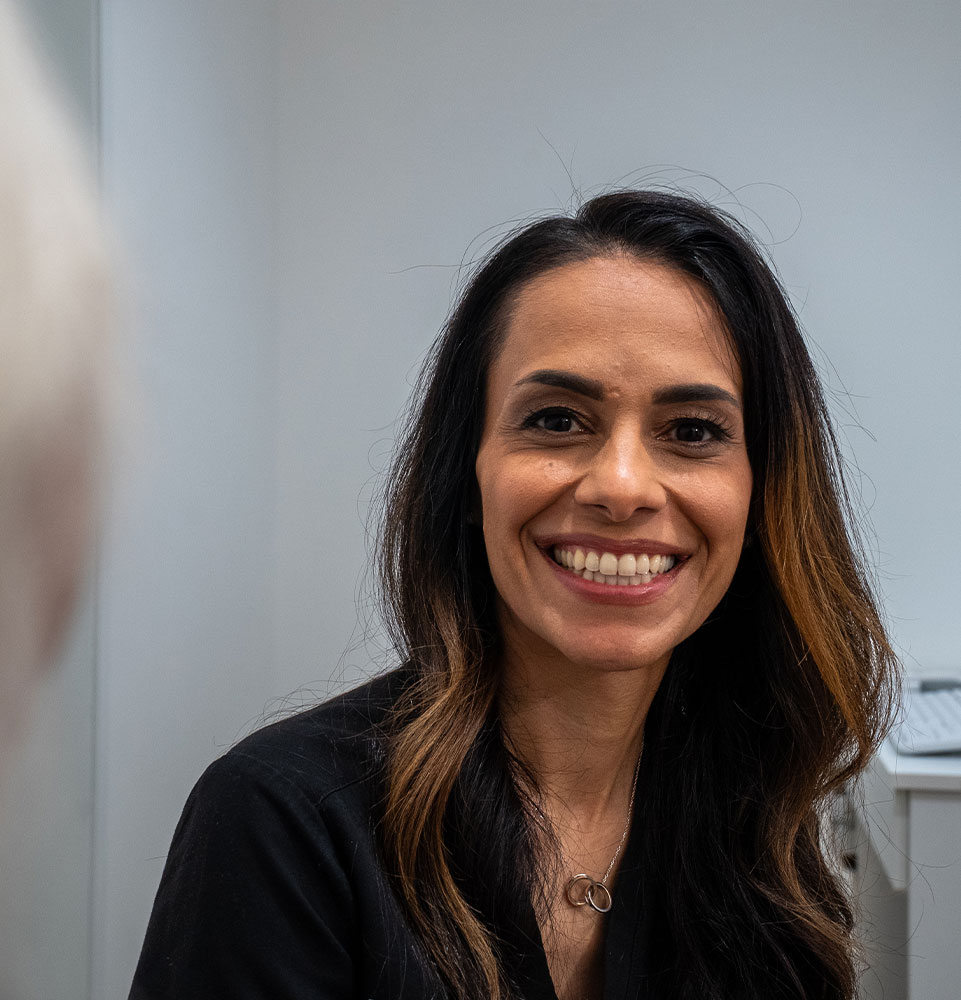 team member consulting with patient